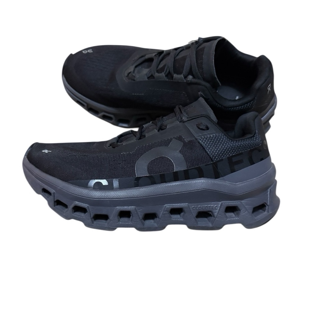 On cloud cloudmonster sneakers black/magnet